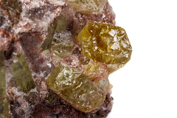 Macro mineral stone.Golden Apatite on a white background