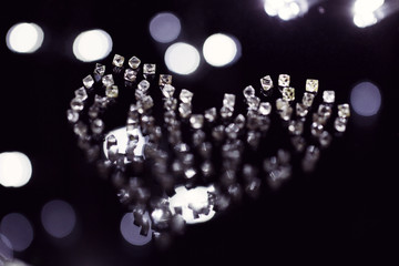 blur diamonds in shape of heart with bokeh