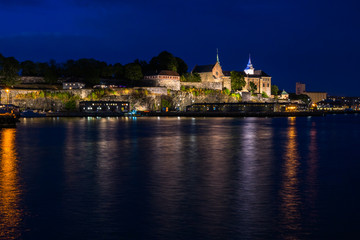 Fototapeta na wymiar Night view of the Akershus fortress, the medieval castle built to protect Oslo, Norway