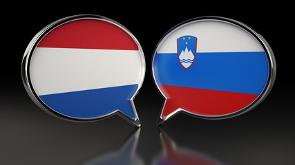 Netherlands and Slovenia flags with Speech Bubbles. 3D illustration