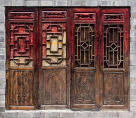 Fototapeta na wymiar Old Chinese doors in Fenghuang, Hunan, China. Useful as a background.