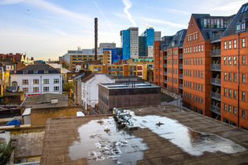 Fototapeta premium London, United Kingdom - Panoramic view of the Whitechapel district of East London with fusion of traditional and modernistic architecture neighboring Whitechapel street