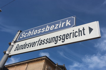 Obraz premium Sign to the federal constitutional court in Karlsruhe, Germany. It is the supreme constitutional court of the Federal Republic of Germany