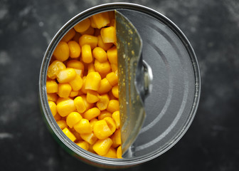 Sweet corn in an opened tin can.