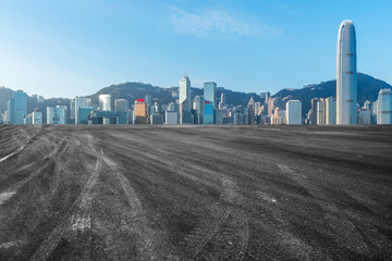 Road and skyline of modern urban architecture in Hong Kong..