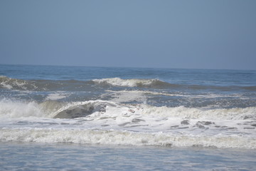 waves breaking on beach