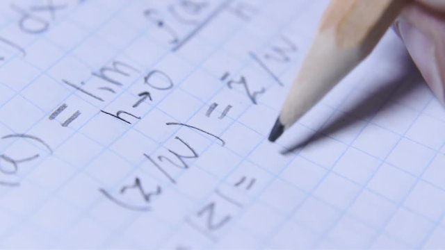 Mathematician Calculates The Difficult Formula On Paper