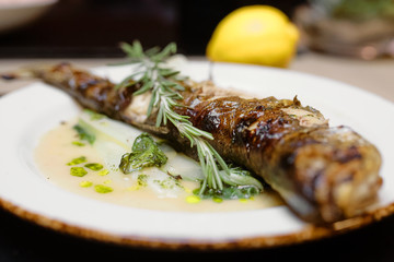 cleaned white fish with lemon
