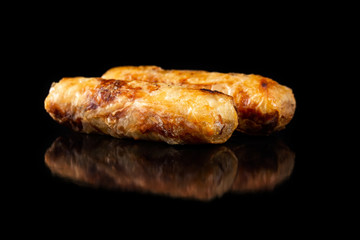 Macro image of traditional vietnamese food  - cha gio spring rolls isolated at black background.