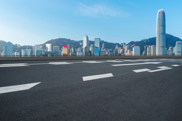 Road and skyline of modern urban architecture in Hong Kong..