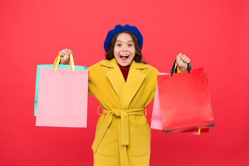 Get discount shopping on birthday holiday. Fashionista adore shopping. Customer satisfaction. Prime time buy spring clothing. Obsessed with shopping. Girl cute kid hold shopping bags red background