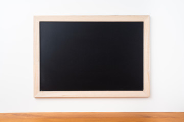 blackboard on white background with teak floor