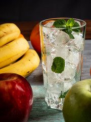 Apple, red green, bananas, oranges, tangerines, pomelo, juice, ice