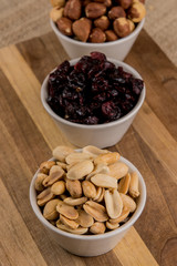 nuts in bowl on wooden table