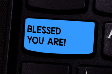 Text sign showing Blessed You Are. Conceptual photo Spiritual gratitude believe in a greater power to have faith Keyboard key Intention to create computer message pressing keypad idea