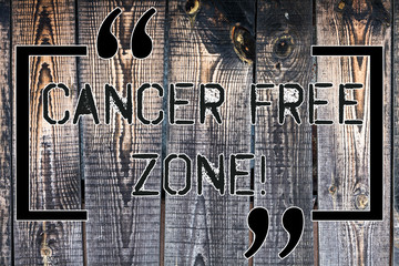 Handwriting text Cancer Free Zone. Concept meaning club for educating showing about means of cancer prevention Wooden background vintage wood wild message ideas intentions thoughts