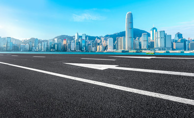 Road and skyline of modern urban architecture in Hong Kong..