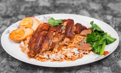 Stewed pork leg on rice with boiled egg, Traditional food in Thailand.