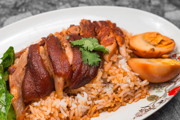 Stewed pork leg on rice with boiled egg, Traditional food in Thailand.