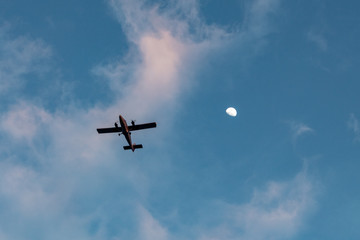 plane and moon