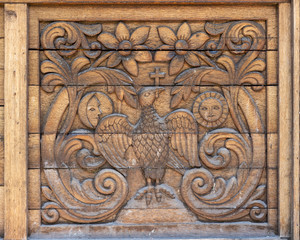 Wood Carving Motif. Close up of wooden panel decoration in northern Romania.