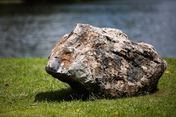 Rock on grass