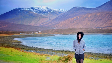 Asian woman with beautiful view of  mountains and river in Highland,Scotland, United kingdom