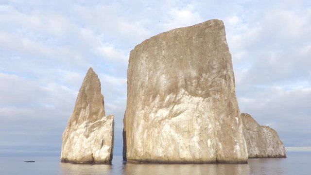 Galapagos Kicker Rock nature landscape. Iconic landmark and tourist destination for birdwatching, diving and snorkeling, San Cristobal Island, Galapagos Islands, Ecuador. Roca Leon Dormido in spanish.