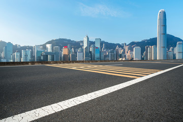 Road and skyline of modern urban architecture in Hong Kong..
