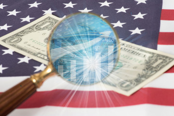 Flagge von USA, Dollar Geldschein und Aktienkurse an der amerikanischen Börse
