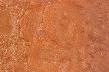 Bronze abstract background. Liquid drawing.