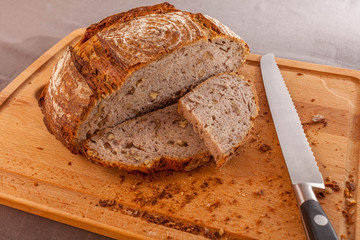 walnut sourdough loaf with bread knife