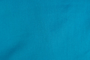 Backgroud of light blue denim jean texture.