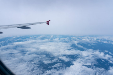 High angle view from window of airplane beautiful sky and white clouds