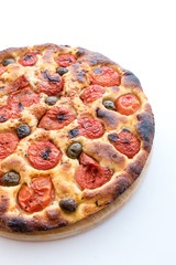 Focaccia typical of Bari Italy with tomatoes and olive
