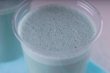 Spirulina cocktail in a transparent glass.