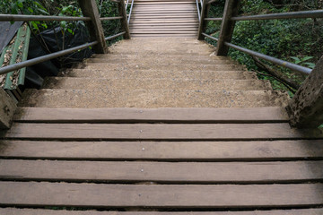 Top view wooden stair over forest hill