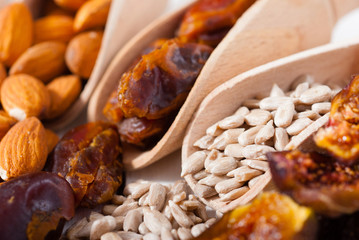 dried super foods on white wood table background