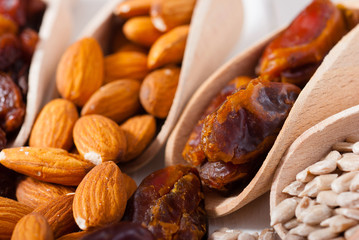 dried super foods on white wood table background