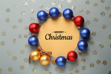 Beautiful Christmas decorations with empty card on grey background