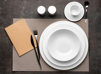 Simple table setting on grey background