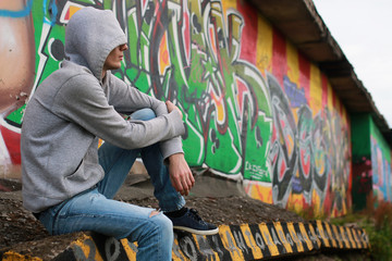 a young man in a hoodie hip-hop