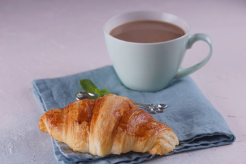 Breakfast with fresh croissants.