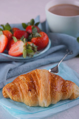 Breakfast with fresh croissants.