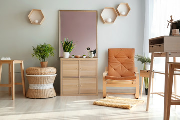Stylish interior of room with wooden furniture