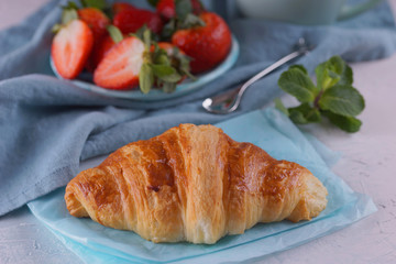 Breakfast with fresh croissants.