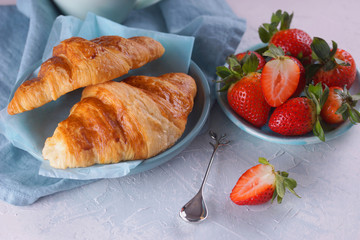 Breakfast with fresh croissants.