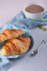 Breakfast with fresh croissants.