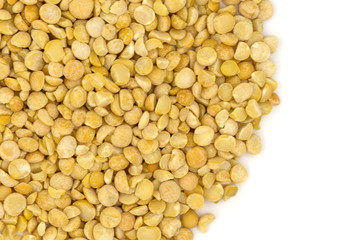 Yellow split peas isolated on white background