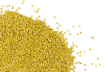 Yellow millet groats isolated on white background